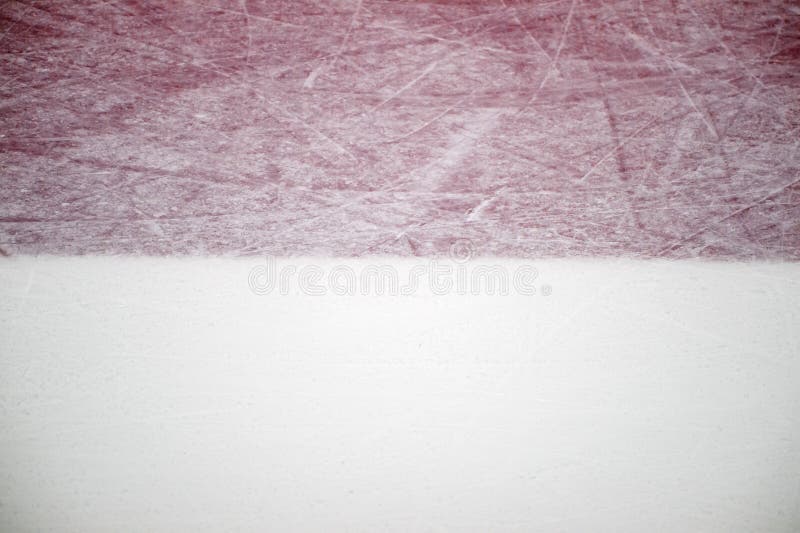 Ice hockey rink red markings closeup, winter sport background. Ice hockey rink red markings closeup, winter sport background.