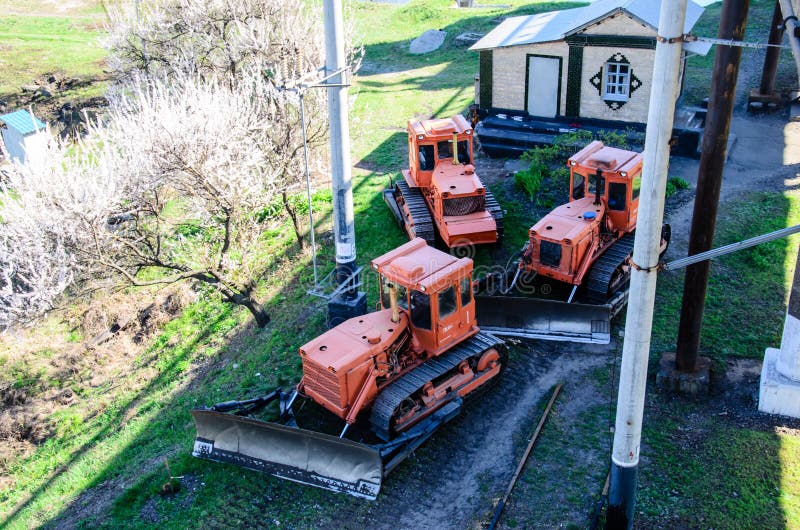 Red heavy bulldozers at a construction site. Red heavy bulldozers at a construction site