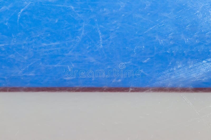 Red goal line on ice hockey rink. Winter sport. Red goal line on ice hockey rink. Winter sport.