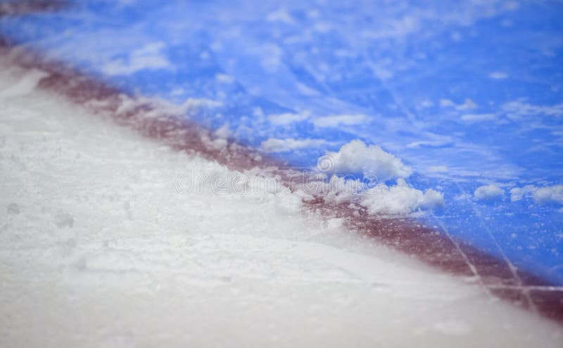 Red goal line on ice hockey rink. Winter sport. Red goal line on ice hockey rink. Winter sport.