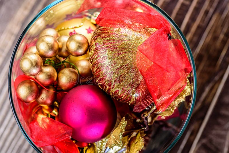 Red and golden Christmas baubles in a shallow depth of field. Red and golden Christmas baubles in a shallow depth of field