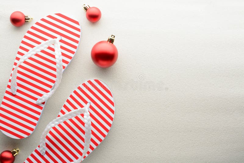 Red and white flip flops and Christmas y ornaments. Red and white flip flops and Christmas y ornaments