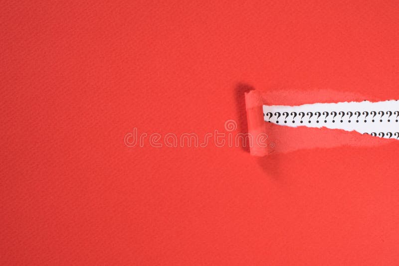 Red paper teared revealing question mark on white paper. concept of FAQ, Q&A, search, riddle information and questions. Red paper teared revealing question mark on white paper. concept of FAQ, Q&A, search, riddle information and questions
