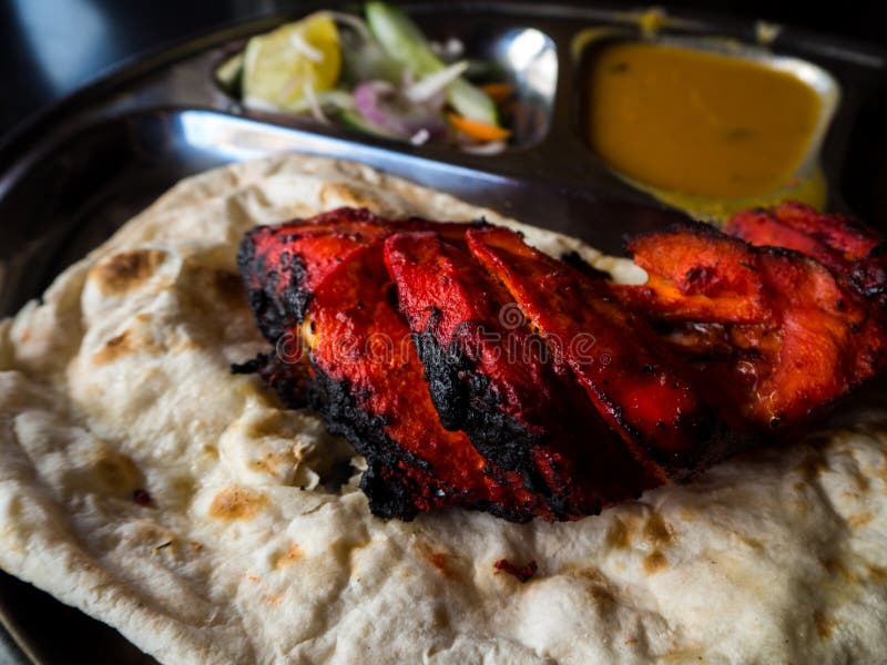 Roti Prata with chicken. A popular Indian-influenced food in Malaysia stock photography Roti Prata with chicken. A popular Indian-influenced food in Malaysia stock photography