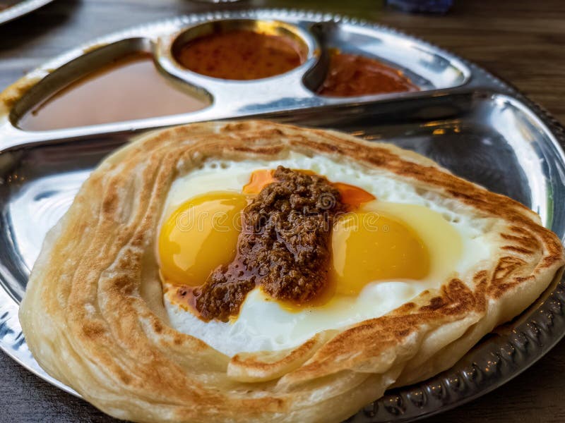 Roti Sarang Burung Served with Different Gravies. it is Pratha Looks