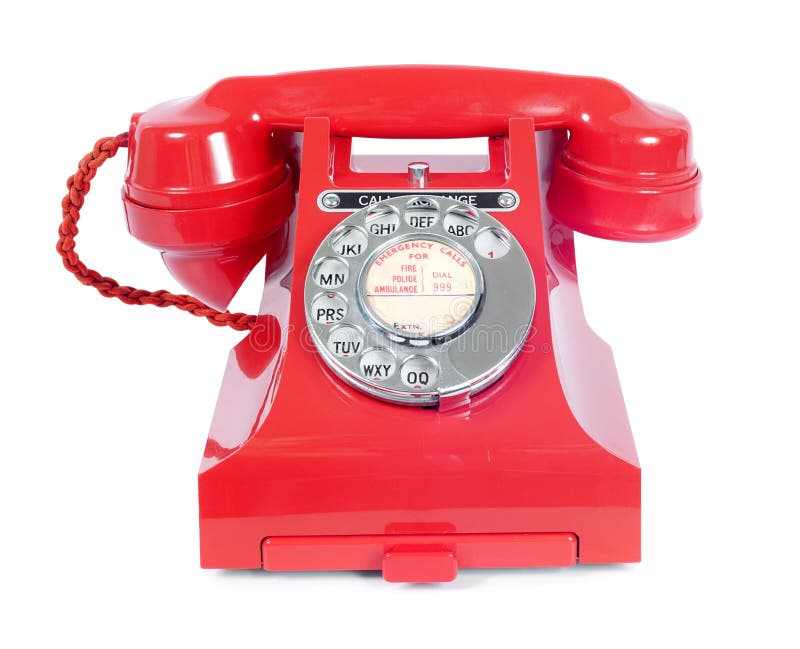 Classic British vintage rotary dial red telephone on white background from the 1950s with call exchange button. Classic British vintage rotary dial red telephone on white background from the 1950s with call exchange button