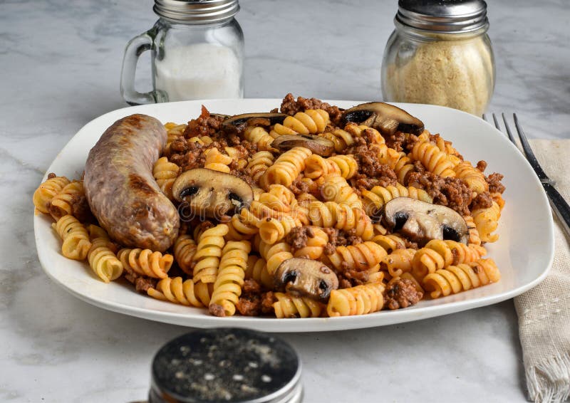 Rotini Pasta with a Meat Sauce and Mushrooms Stock Image - Image of