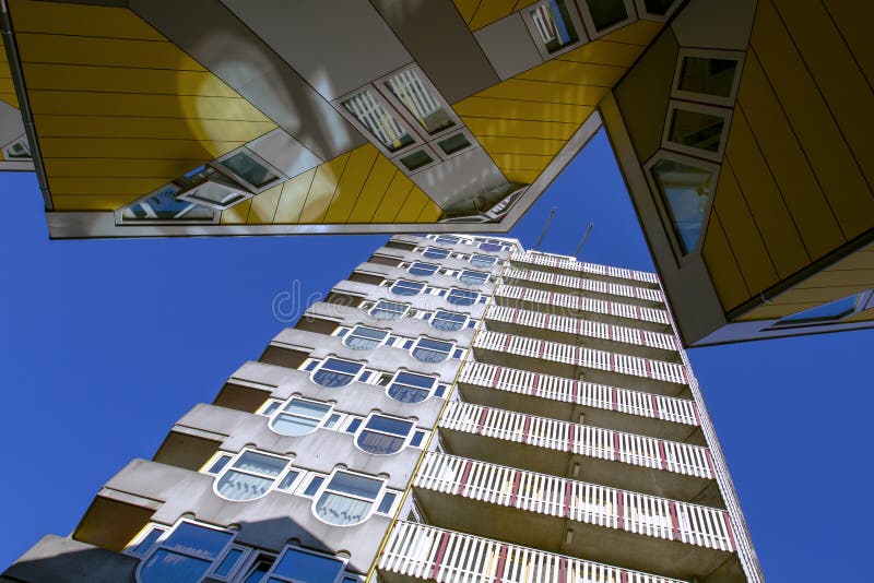 ROTTERDAM, NETHERLANDS on July 01, 2015. Cube houses and of skyscrapers in center of Rotterdam, a background with a blue sky. stock photos ROTTERDAM, NETHERLANDS on July 01, 2015. Cube houses and of skyscrapers in center of Rotterdam, a background with a blue sky. stock photos