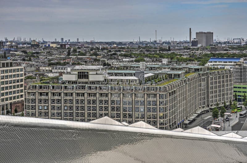 Groothandelsgebouw and central station. Rotterdam, The Netherlands, June 10, 2017: Architectural monument Groothandelsgebouw Grand Trade Building next to the royalty free stock photography Groothandelsgebouw and central station. Rotterdam, The Netherlands, June 10, 2017: Architectural monument Groothandelsgebouw Grand Trade Building next to the royalty free stock photography