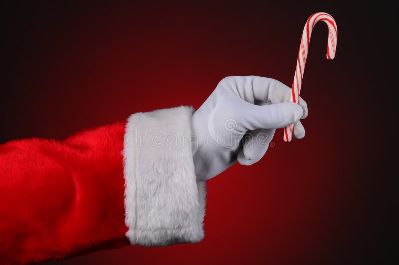 Rotting för godis för Santa Claus handHolding