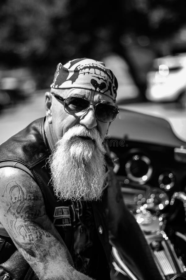 Biker Gang Man On Motorcycle Stock Photo - Image of indoors, european ...