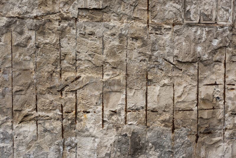 Rough Broken Concrete Wall with Rusty Metal Bars Background Text Stock