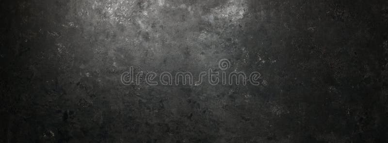 Rough, dark stone background lit by spotlight background stock image