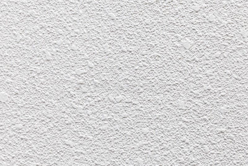 Rough Patterned White Cement Wall Texture and Seamless Stock Image