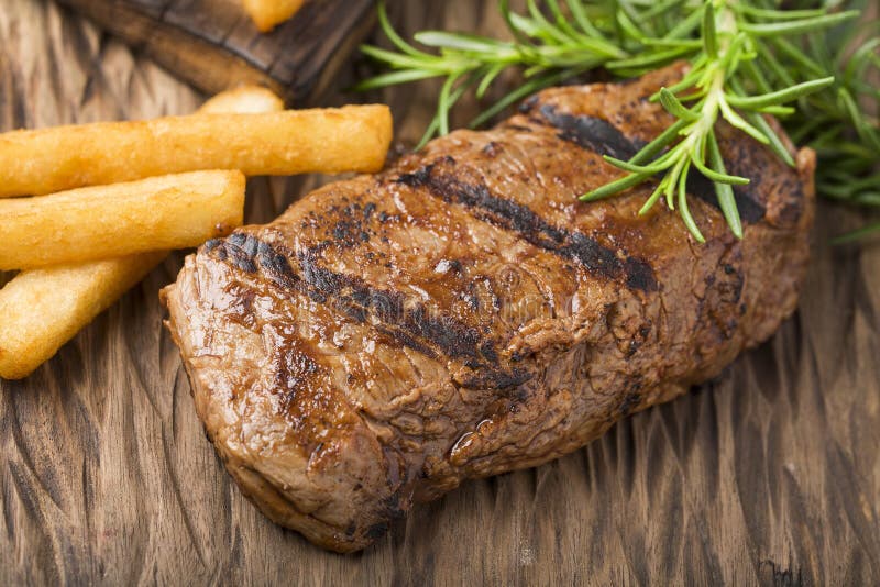 Round beef roast - Fried yucca. Top view stock photography
