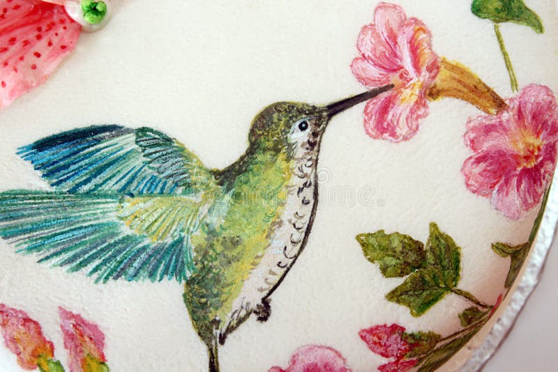 Round cake with fondant and painted humming-bird royalty free stock image Round cake with fondant and painted humming-bird royalty free stock image