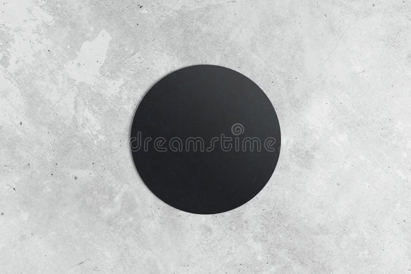 Round coaster on concrete surface stock image