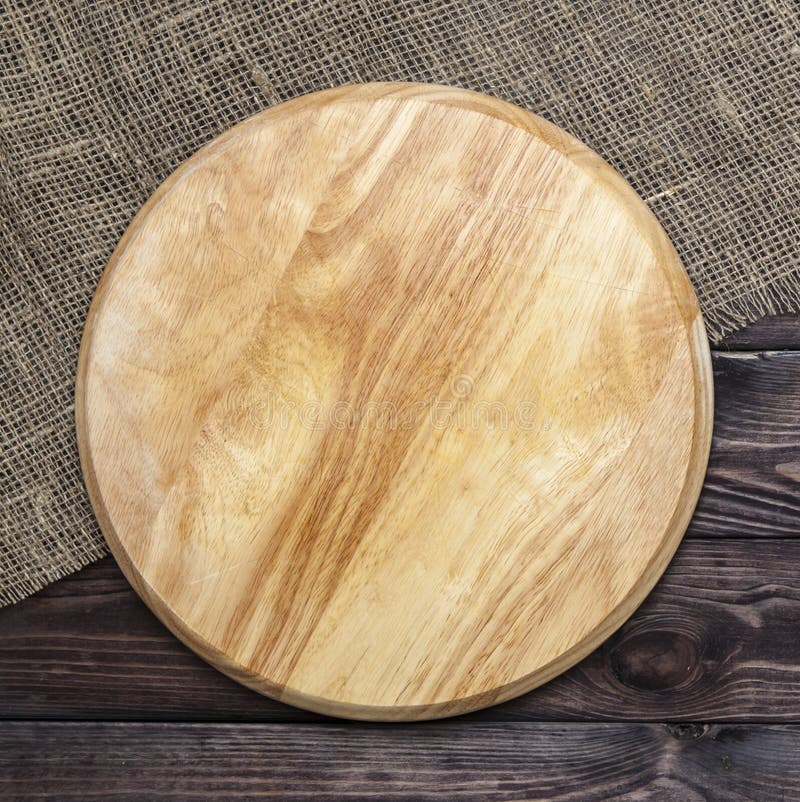 Round Cutting Board on a Wooden Table, Top View Stock Image Image of