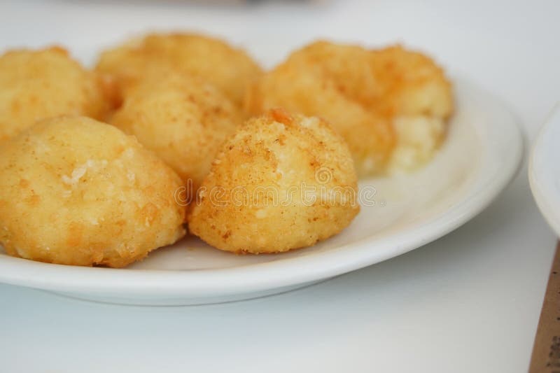 Round Panned and Fried Cheese Balls Filled with Mozzarella Stock Image