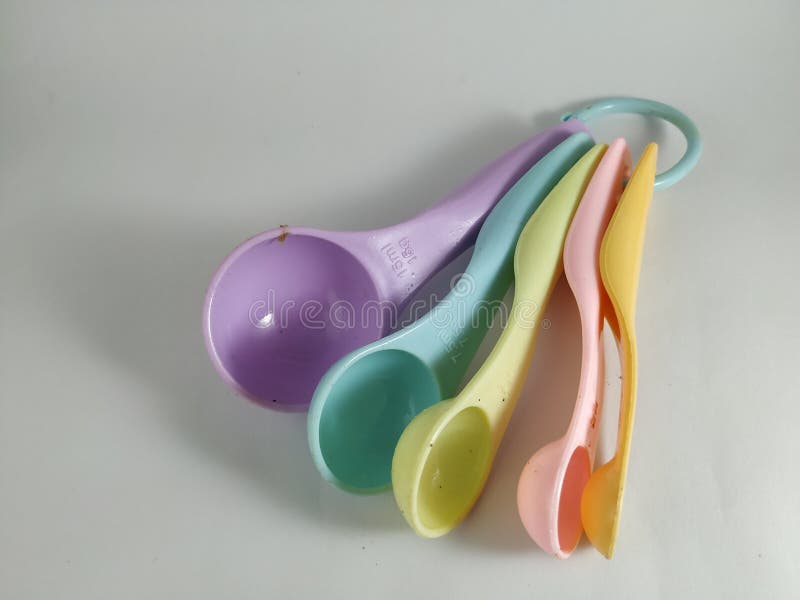 Round Plastic Spoon for Measuring the Spices when Cooking Stock Photo