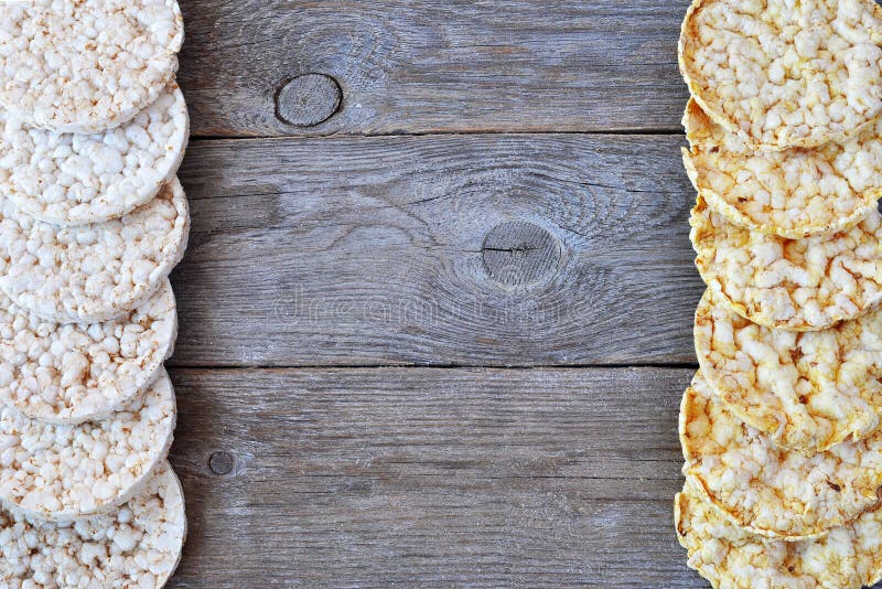 Round Rice Cakes and Corn Cakes on Wooden Table. Stock Photo Image of