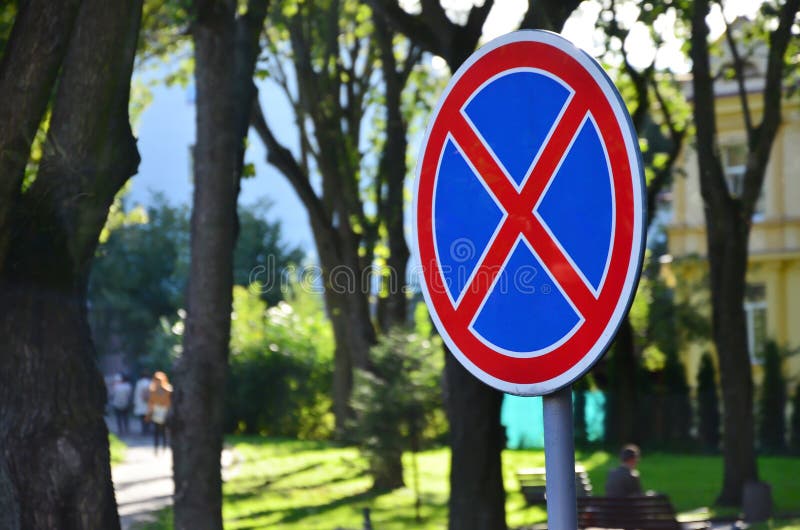 Round Road Sign with a Red Cross on a Blue Background. a Sign ...