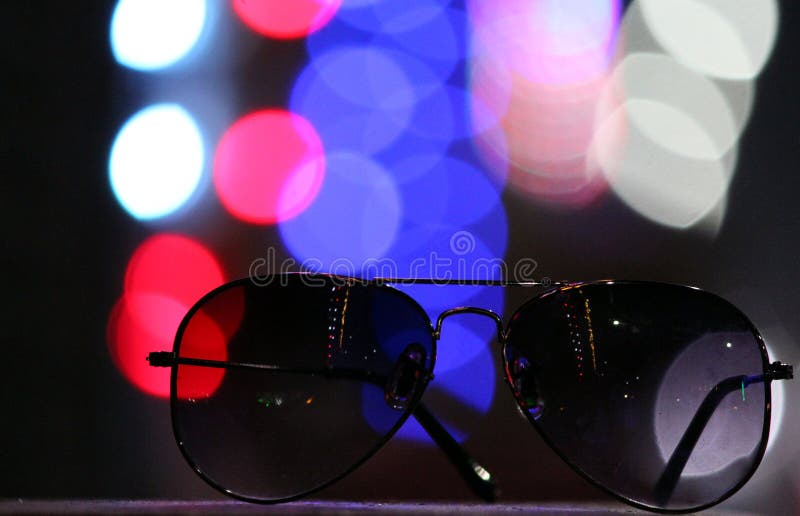 Round Sunglasses with Blurred Background Stock Image Image of white