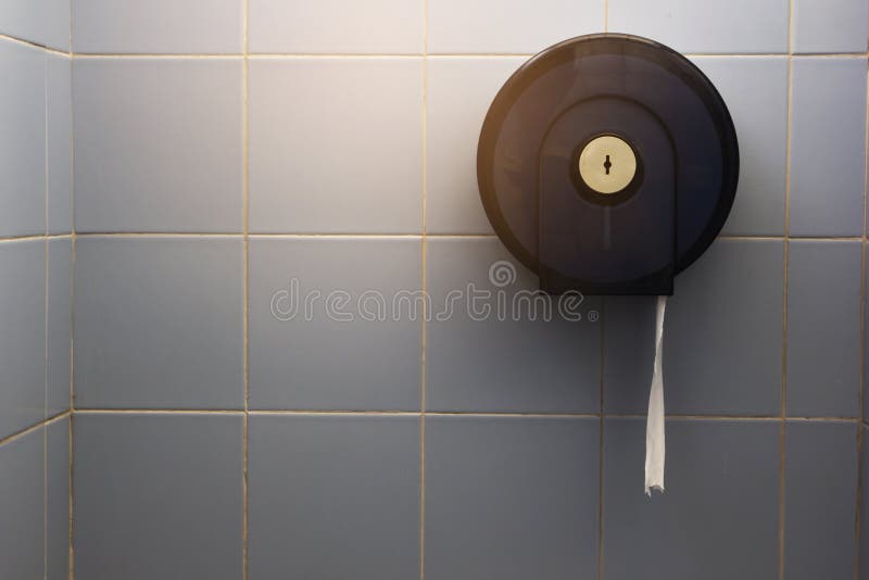 Round Toilet Paper Box. Toilet Paper Box Hung on the Wall in the Toilet