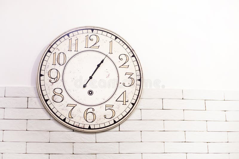 Round Wall Clock on the Wall. Time Translation, Stock Photo Image of