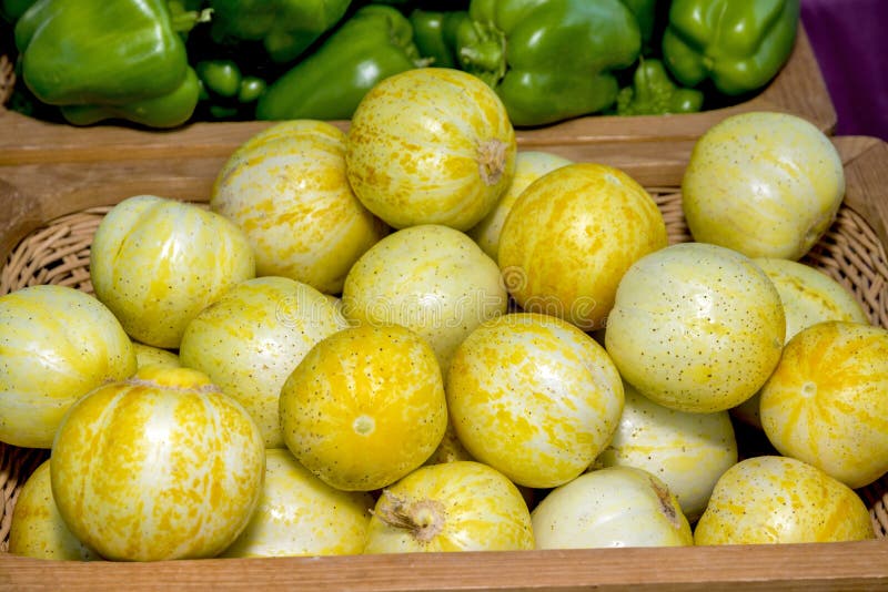 Round Yellow Vegetables In A Basket At A Market Stock Photo - Image of ...