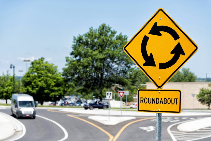 Roundabout sign at intersection