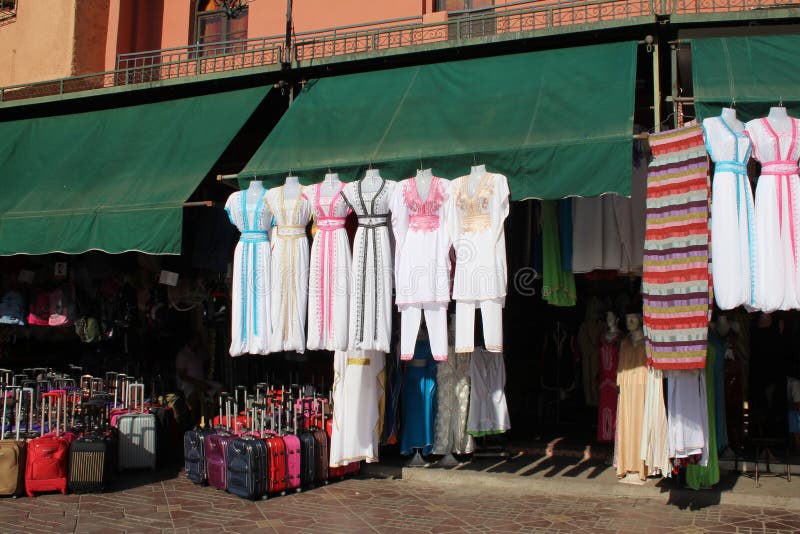 Souvenirs on display in Essaouira, Morocco: typical white dresses. Souvenirs on display in Essaouira, Morocco: typical white dresses