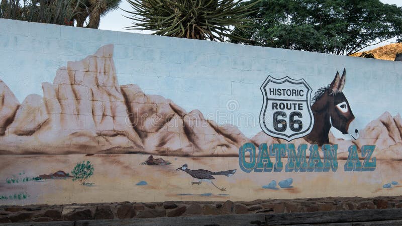OATMAN, AZ/USA - MAY 13, 2013: Historic Route 66 mural commemorates the Oatman donkeys. OATMAN, AZ/USA - MAY 13, 2013: Historic Route 66 mural commemorates the Oatman donkeys.