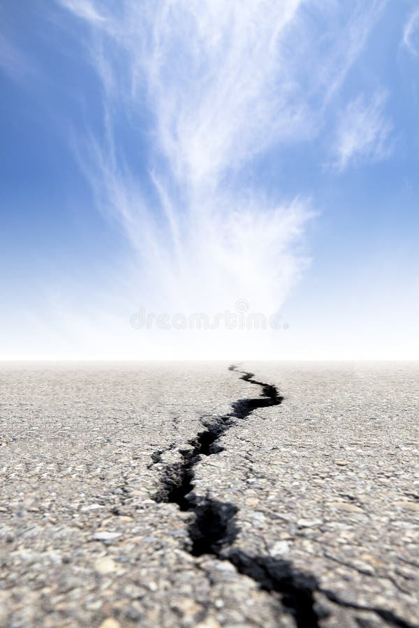 Cracked road with cloud background. Cracked road with cloud background