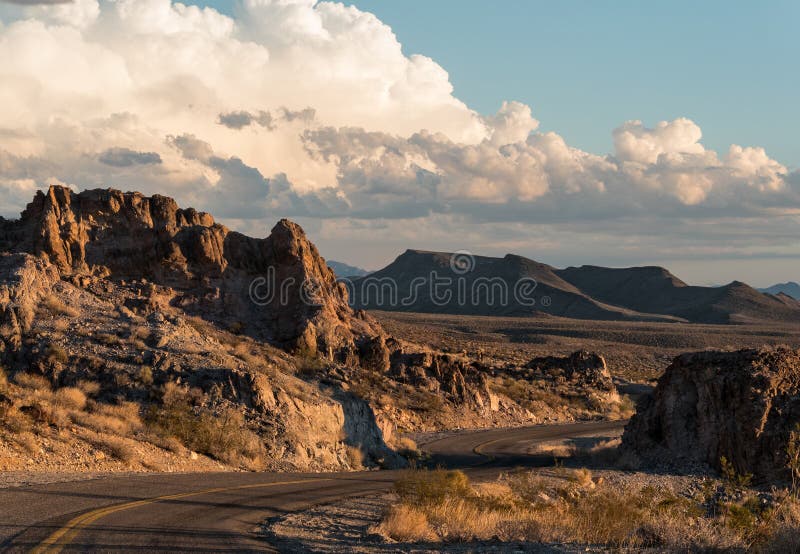 Long shadows along historic Route 66 near Oatman, Arizona at the base of the Black Mountains. Long shadows along historic Route 66 near Oatman, Arizona at the base of the Black Mountains