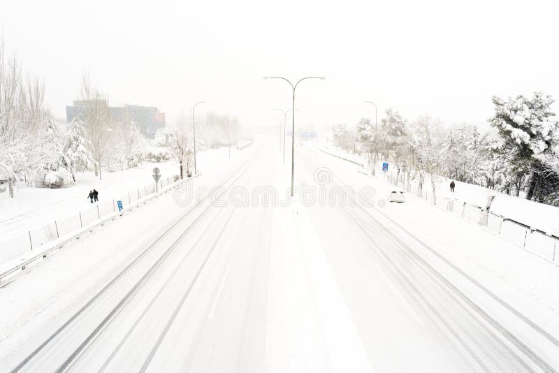 Snow covered highway on a cold winter day after a heavy snowfall. Madrid. A-2. Spain. Snow covered highway on a cold winter day after a heavy snowfall. Madrid. A-2. Spain