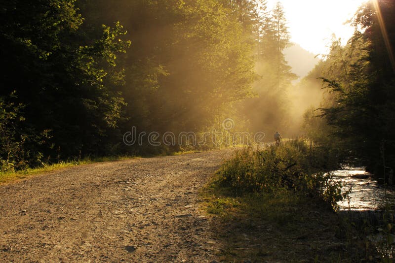 Dusty road and beautiful sun rays. Dusty road and beautiful sun rays