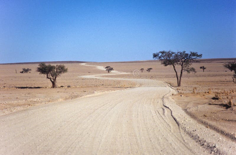 A winding and dusty road in Namibia. A winding and dusty road in Namibia