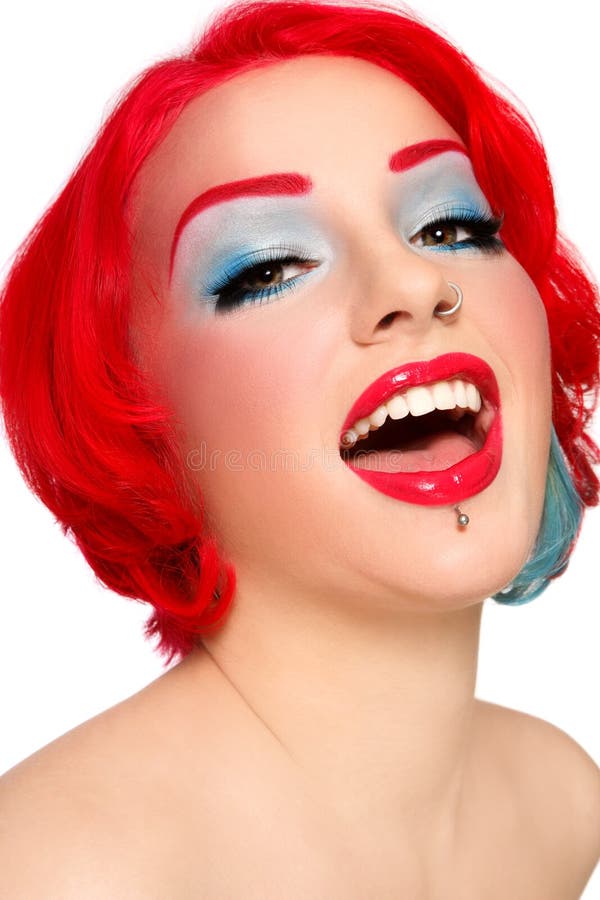 Portrait of young beautiful redhead joyfull laughing girl with fancy make-up. Portrait of young beautiful redhead joyfull laughing girl with fancy make-up