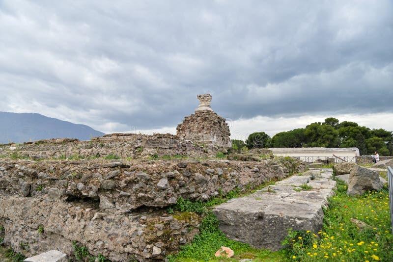 Ruins of ancient city of Pompeii, destroyed by volcano Mount Vesuvius, two millenniums ago, 79 AD. open for visitors, a popular destination for tourists in Italy. Ruins of ancient city of Pompeii, destroyed by volcano Mount Vesuvius, two millenniums ago, 79 AD. open for visitors, a popular destination for tourists in Italy