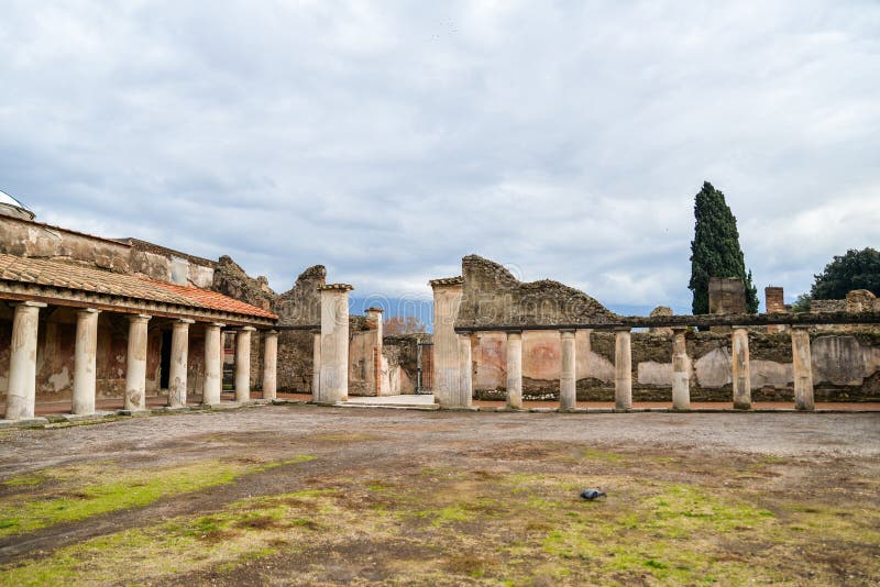 Ruins of ancient city of Pompeii, destroyed by volcano Mount Vesuvius, two millenniums ago, 79 AD. open for visitors, a popular destination for tourists in Italy. Ruins of ancient city of Pompeii, destroyed by volcano Mount Vesuvius, two millenniums ago, 79 AD. open for visitors, a popular destination for tourists in Italy