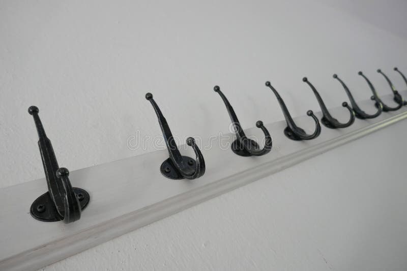 Row of coat hooks stock photo. Image of metal, near, contemporary 58627680