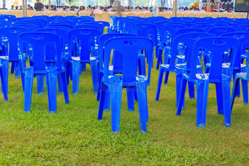 Row of Blue Chairs Plastic on Lawn in Tent Stock Image Image of empty