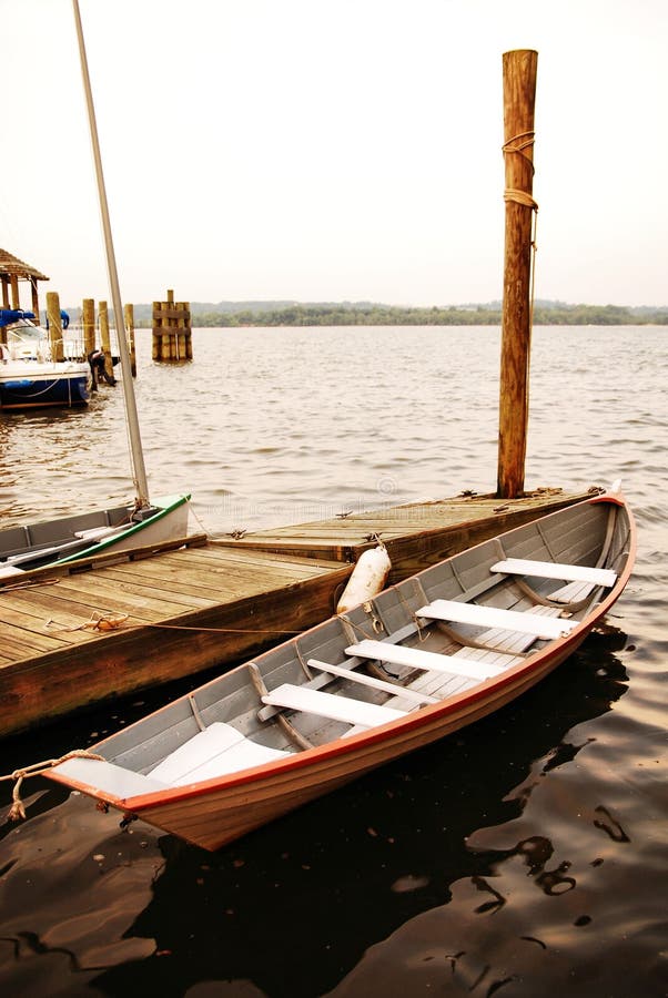 Row boat at the dock. stock photo. Image of small, deck 