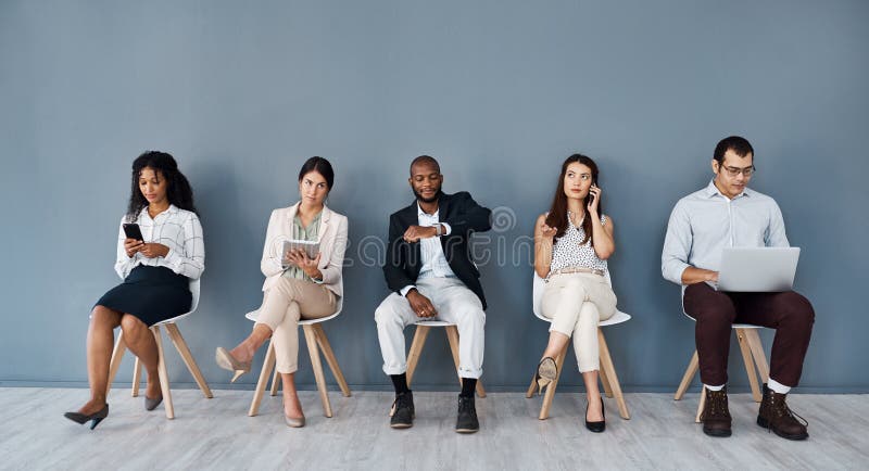 Row, business and people online for job interview with resume, recruitment process and application. Candidates, digital stock photography