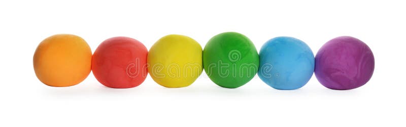 Row of color play dough balls isolated on white