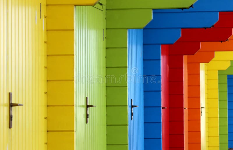 Colorful wooden beach chalets royalty free stock images