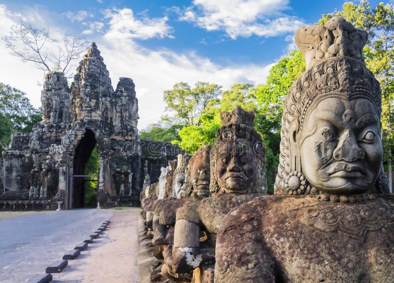 Row of demons statues in the South Gate of Angkor Thom complex, Siem Reap, Cambodia