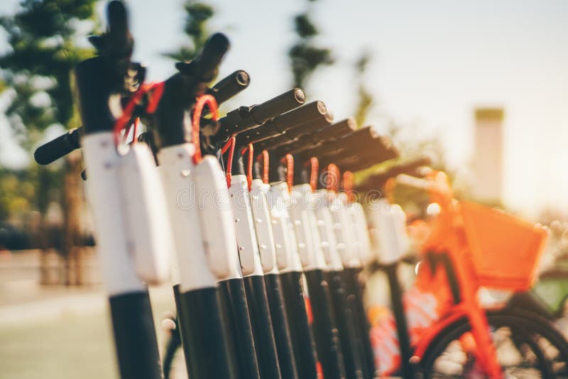 A row of electric scooters outdoors stock images A row of electric scooters outdoors stock images