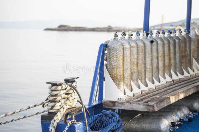 Row of Full Oxygen Tanks for Scuba Diving Stock Image Image of steel
